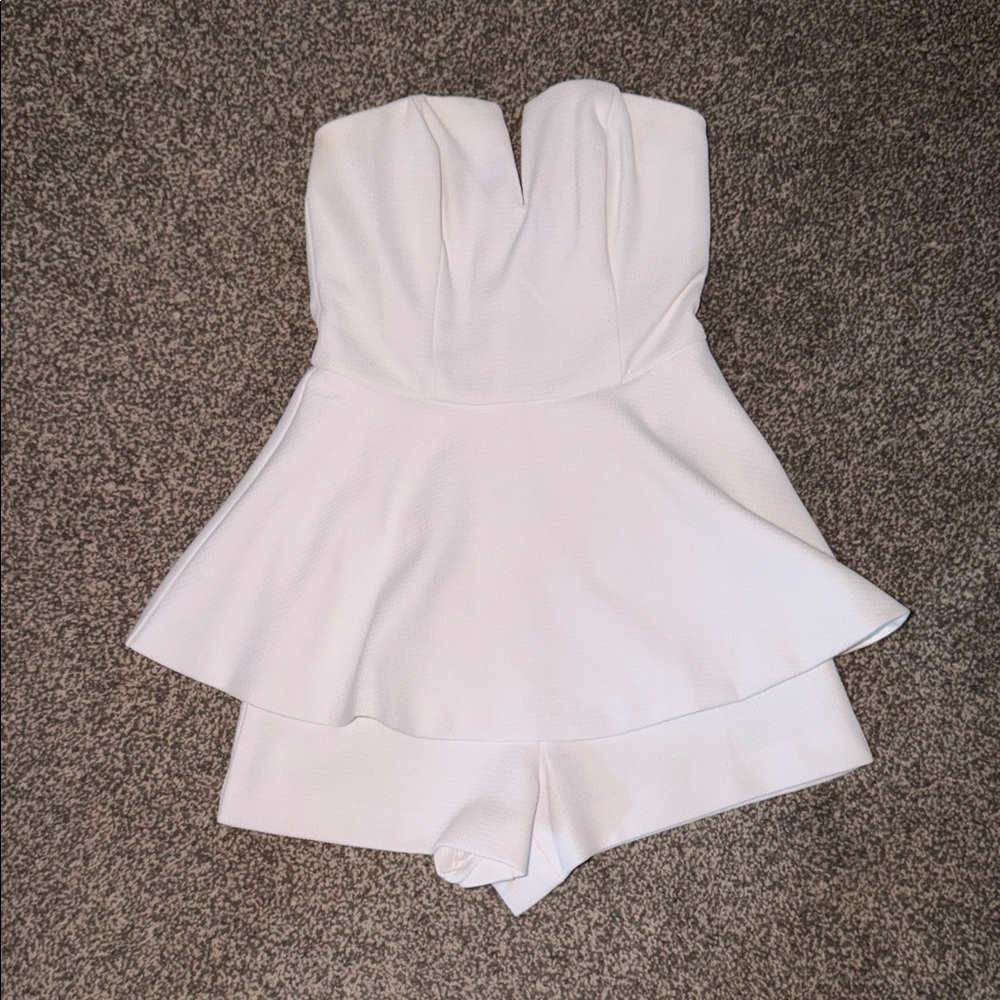 Lulu's Ivory Strapless Peplum Romper